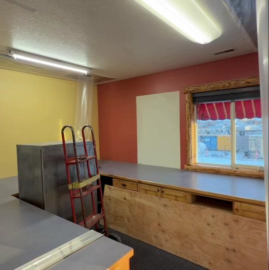 Strong winds took part of the roof, and rain + snow did the rest. Wat...